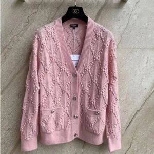 PRE OWNED WHTB CARE CHANEL CARDIGAN